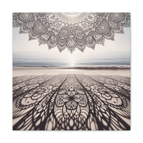 A canvas art piece depicting an intricate lace pattern casting a shadow over a sandy beach with the ocean in the background at sunset.