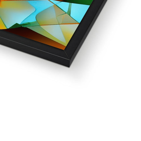 A small picture frame is sitting on top of a tall black computer screen.