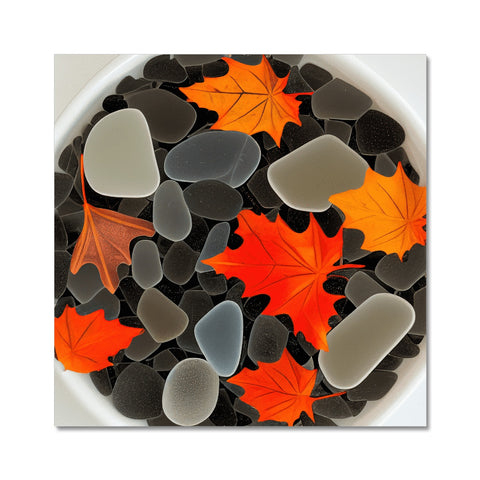 A pile of leaves on a black stone and a picture plate.