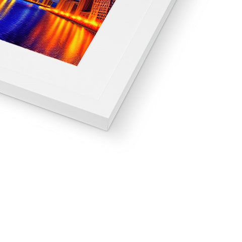 A photograph is printed on a softcover book in a brown frame.