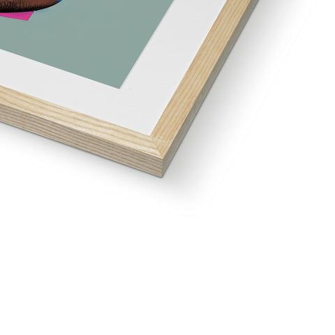 A picture of a small frame holding a photo of a wood frame on a table in
