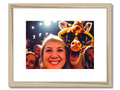 A picture of a giraffe in the palm of her hand on a picture frame.