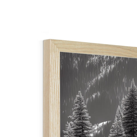 A picture frame with wooden panels that have a picture of a snowy mountain landscape attached to