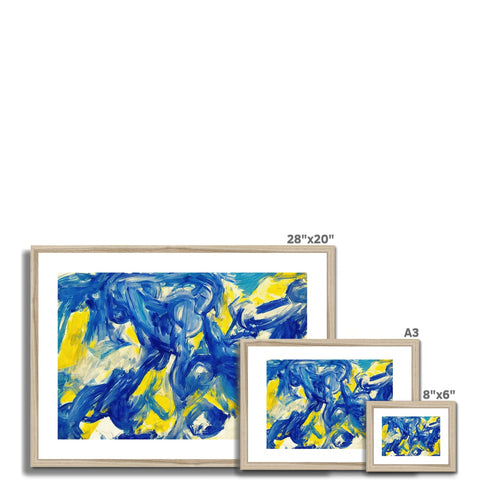 Two white picture frames on metal walls with blue and yellow artwork in them.