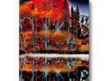 A painting of flames painted onto a blanket that is partially covered with a photograph.