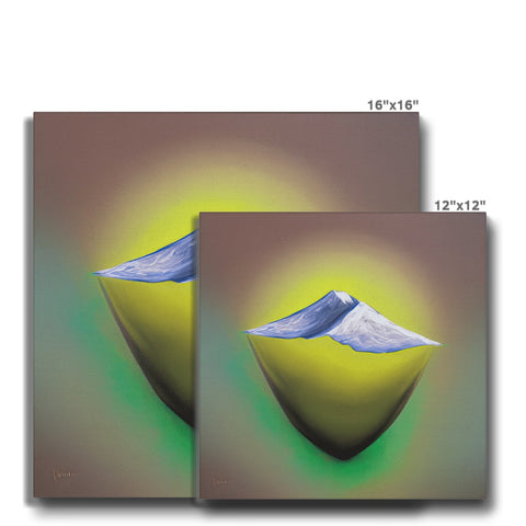Three different art prints of mountain peaks sitting on a table.