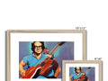 A picture frame that has one blue photo and an orange picture of a blue guitar behind
