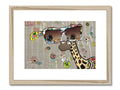 Giraffe staring at an image of a giraffe in an elephant print print on