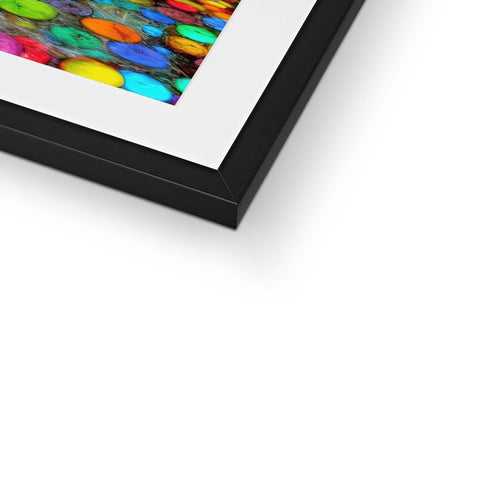 A colorful picture of another picture on a picture frame on a glass case.