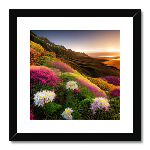 A gold framed photograph of a field of grasses and flowers with a mountain view of