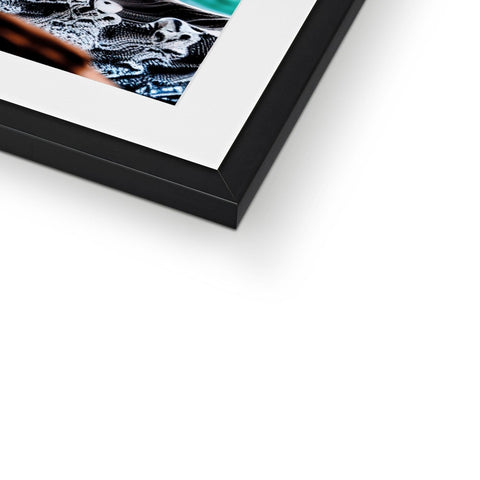 An art print in a frame with a picture of an abstract object on it of a