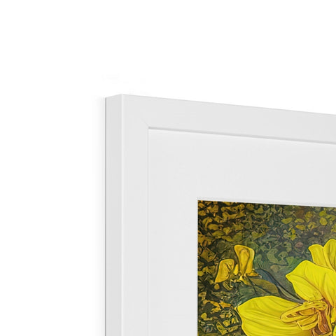 A picture picture of yellow daffodils on the frame next to a framed print