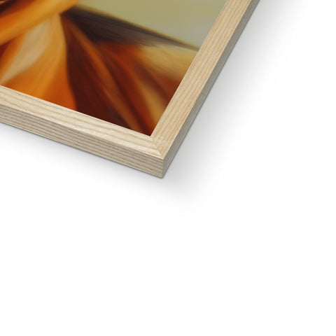 An abstract picture framed in a brown frame.