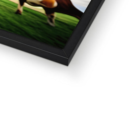 A photograph of a picture frame with a cow posing on it.