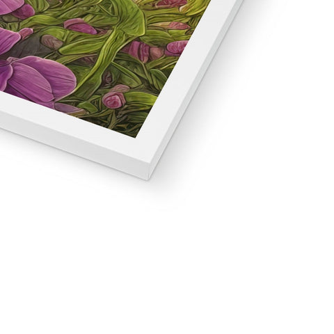 A picture of a floral picture frame, a floral print, and artwork on white pages