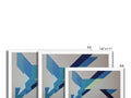 A colorful art print of a four planes on tile set next to an artwork of a