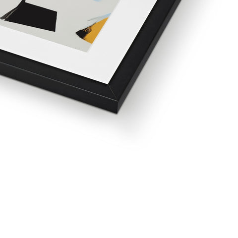 A picture of a white and gold frame on the side of a table.