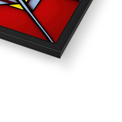 a red triangle is cut into a piece of glass next to a frame.