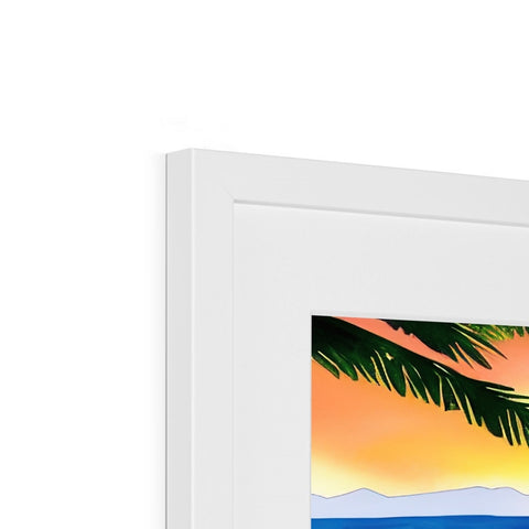 A tropical picture of a palm tree on a white frame that has a sunset sitting next