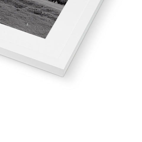 There is a white photo on a softcover photo frame with the text written on it