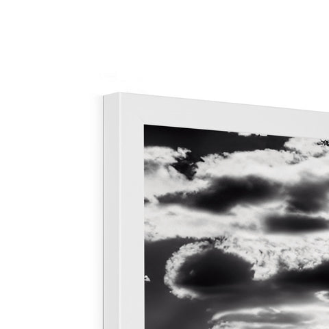 A black and white image of clouds on a flat screen tv.