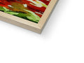 An abstract painted painting is on a wooden frame placed within a wooden box.
