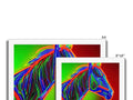 A picture of three horses that are racing past a small black and white computer screen.