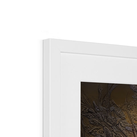 A close view of a white picture frame that has images of two paintings.