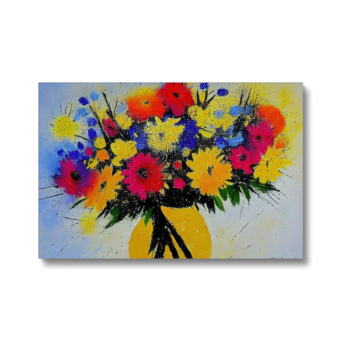 A flower bouquet with an art print and several flowers on it.