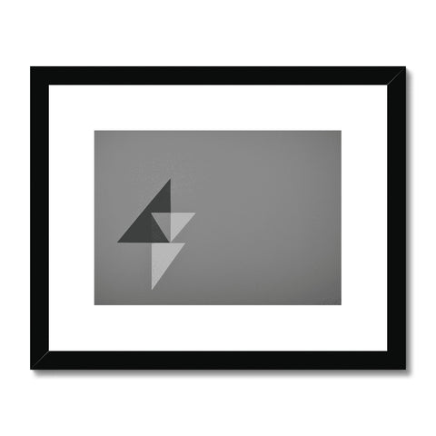 A triangle triangle icon on an iPad in a black and white photo board.