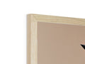 A wooden frame is on top of a shelf with a picture frame.