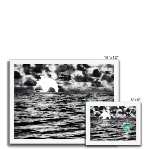 A photo of two sets of black and white images taken of a beautiful ocean background and