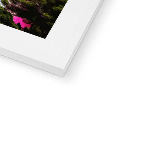 There is a photo of a picture on a frame in a white background.