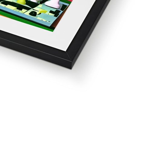 A photo of a green and white picture frame with black and white paintings on it.