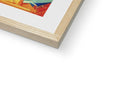 An art print sitting on top of a wooden frame on a table.