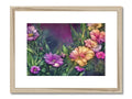 a framed print of a purple and pink picture of flowers that shows two flowers.