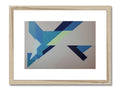 A wood framed art print with white arrows and blue letters