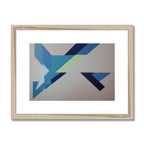A wood framed art print with white arrows and blue letters