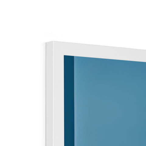 A white picture frame sitting next to a blue TV sitting in a white wall.