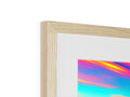 A wooden and colorful photo of pictures on a white frame.