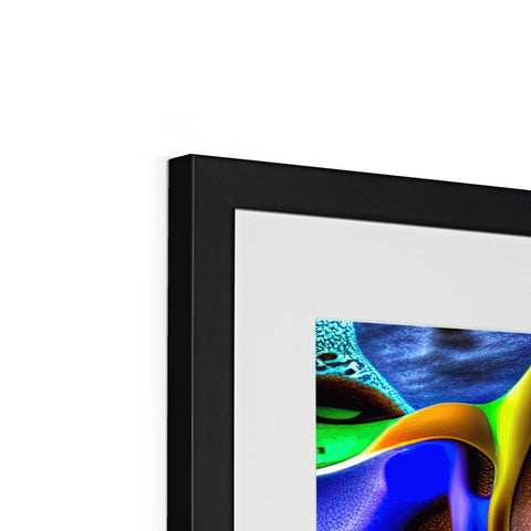 a photograph of a picture frame with light and colors in it sitting on top of a