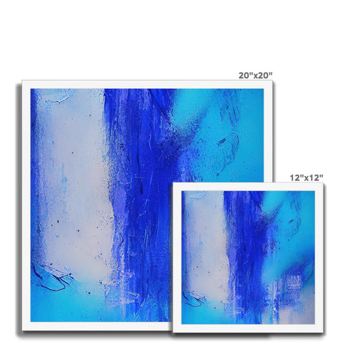 Art Print painting with a blue and white border on a table.