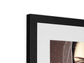 a picture frame with art on it in a black frame and white background