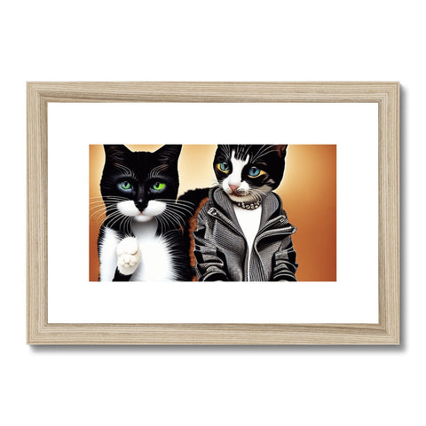 A white metal picture of a couple of cats sitting on a wood frame.