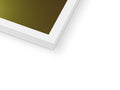 An imac screen with gold foil and a gold pan set on the top plate.