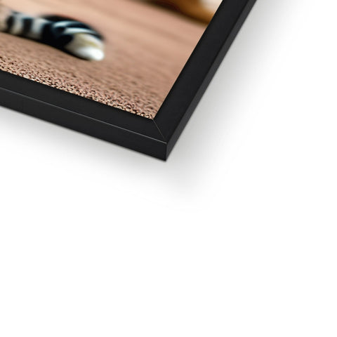 A baseball game picture frame sitting on top of a table with baseball field.