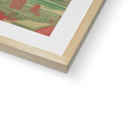 A wooden framed picture of a farm scene on a white background.