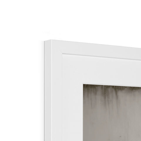 A wall mounted window frame in a room that is completely white