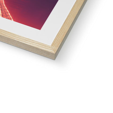 A red photograph with lots of different wood frames on top of it.