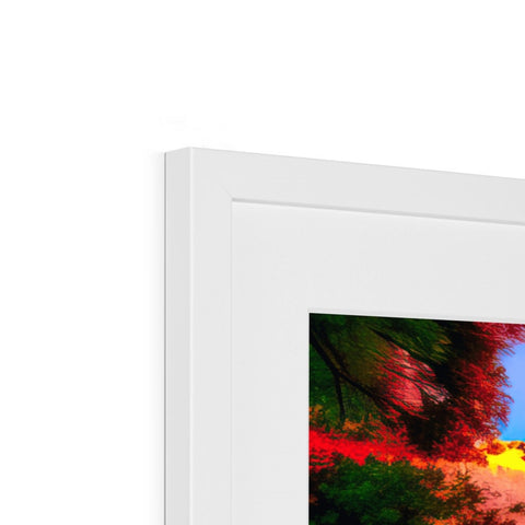 A white picture frame with a picture of a rainbow laying on a table.